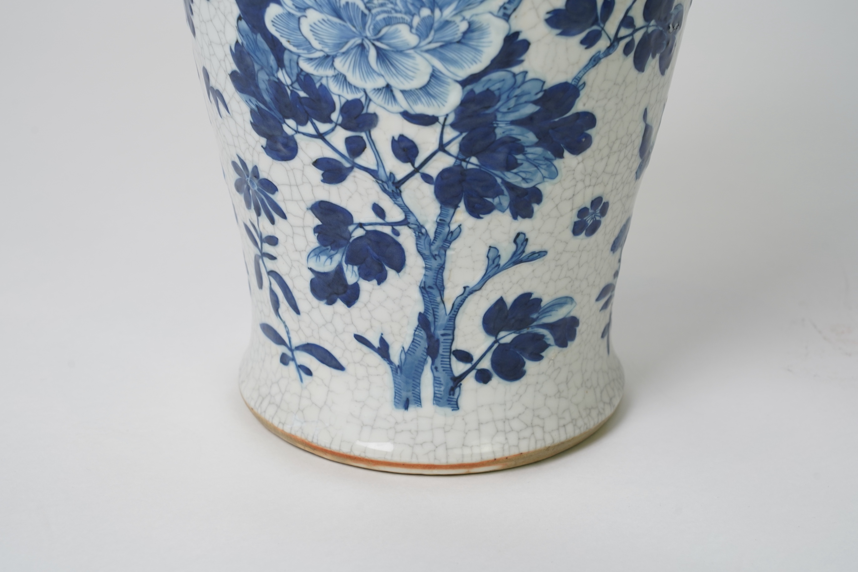 A Chinese blue and white crackle glaze baluster vase and cover, early 20th century